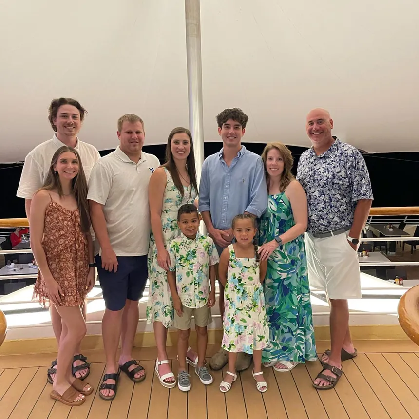 Scott and Rachelle Roberts, owners of Poo Squad Northwest Kansas City, with their family