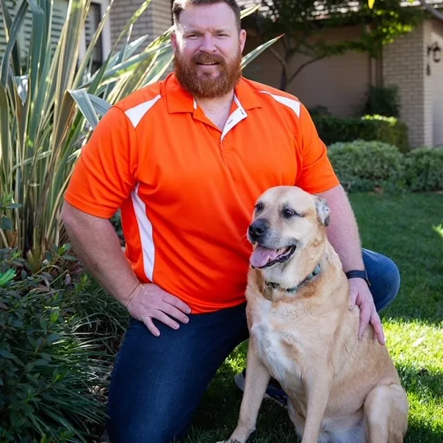 Jasper Jacobs, owner of Poo Squad Sacramento, with his dog